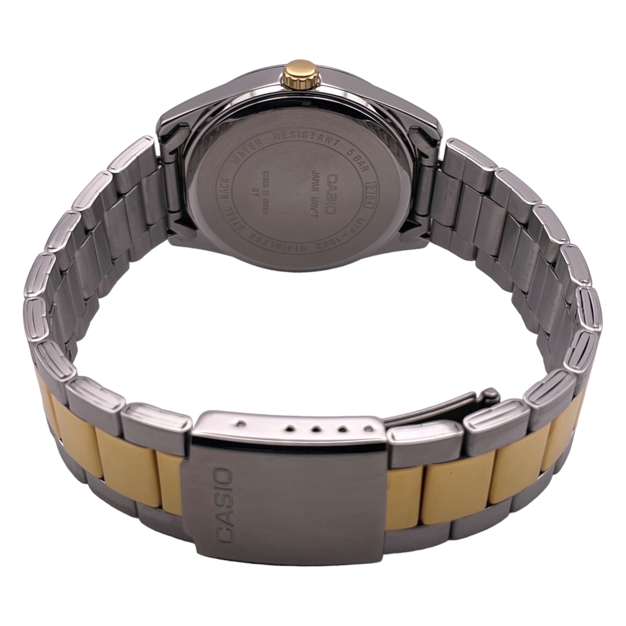 Montre Casio en métal argentée et dorée, avec chiffres arabes, vue de dos