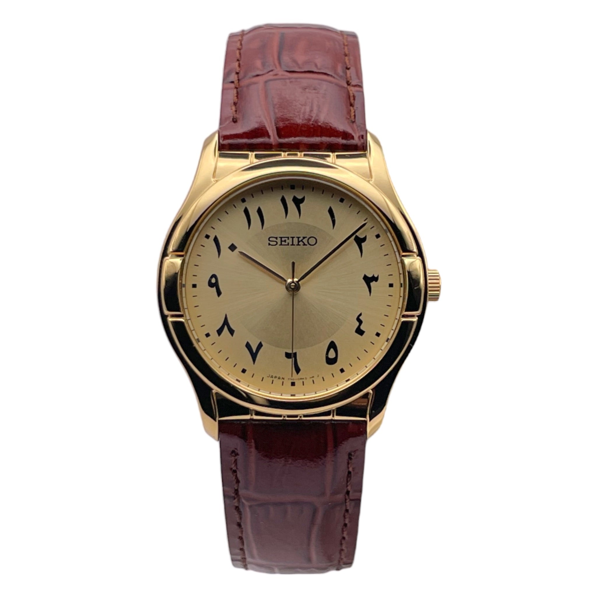 Seiko dorée avec bracelet en cuir marron, édition limitée avec chiffres arabes, vue de face