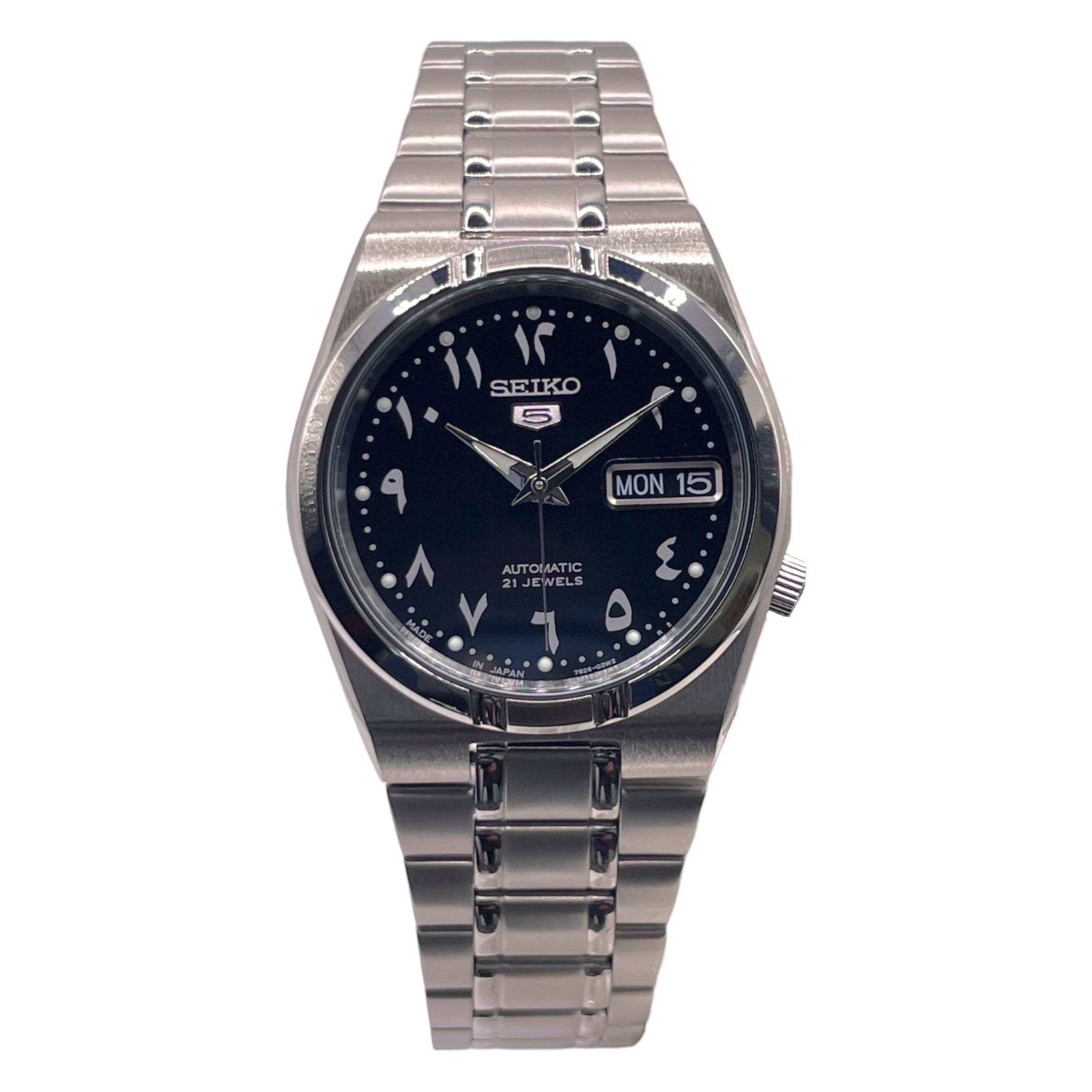 Montre Seiko en acier inoxydable, cadran noir de 34mm avec chiffres arabes, vue de dos
