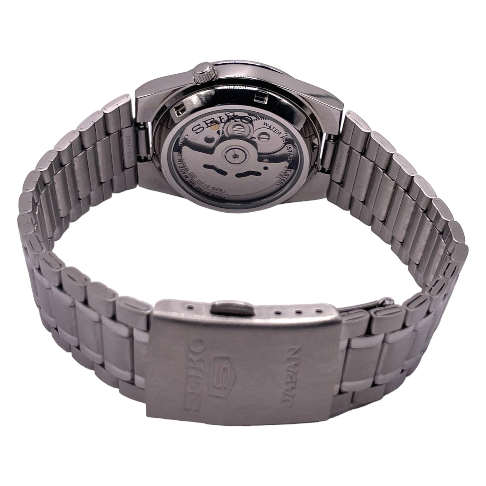 Montre Seiko en acier inoxydable, cadran noir de 34mm avec chiffres arabes, vue de côté