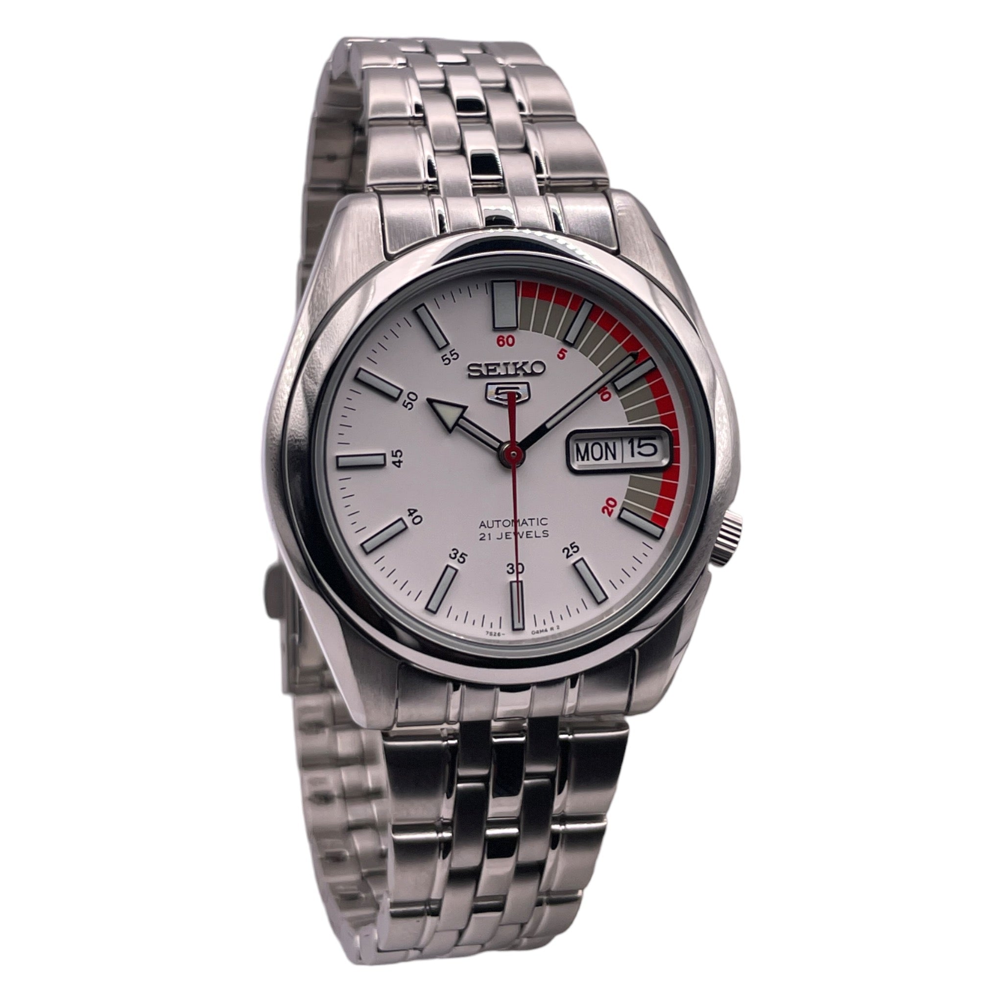 Montre Seiko bracelet métal, cadran de 37mm blanc et rouge, vue de côté