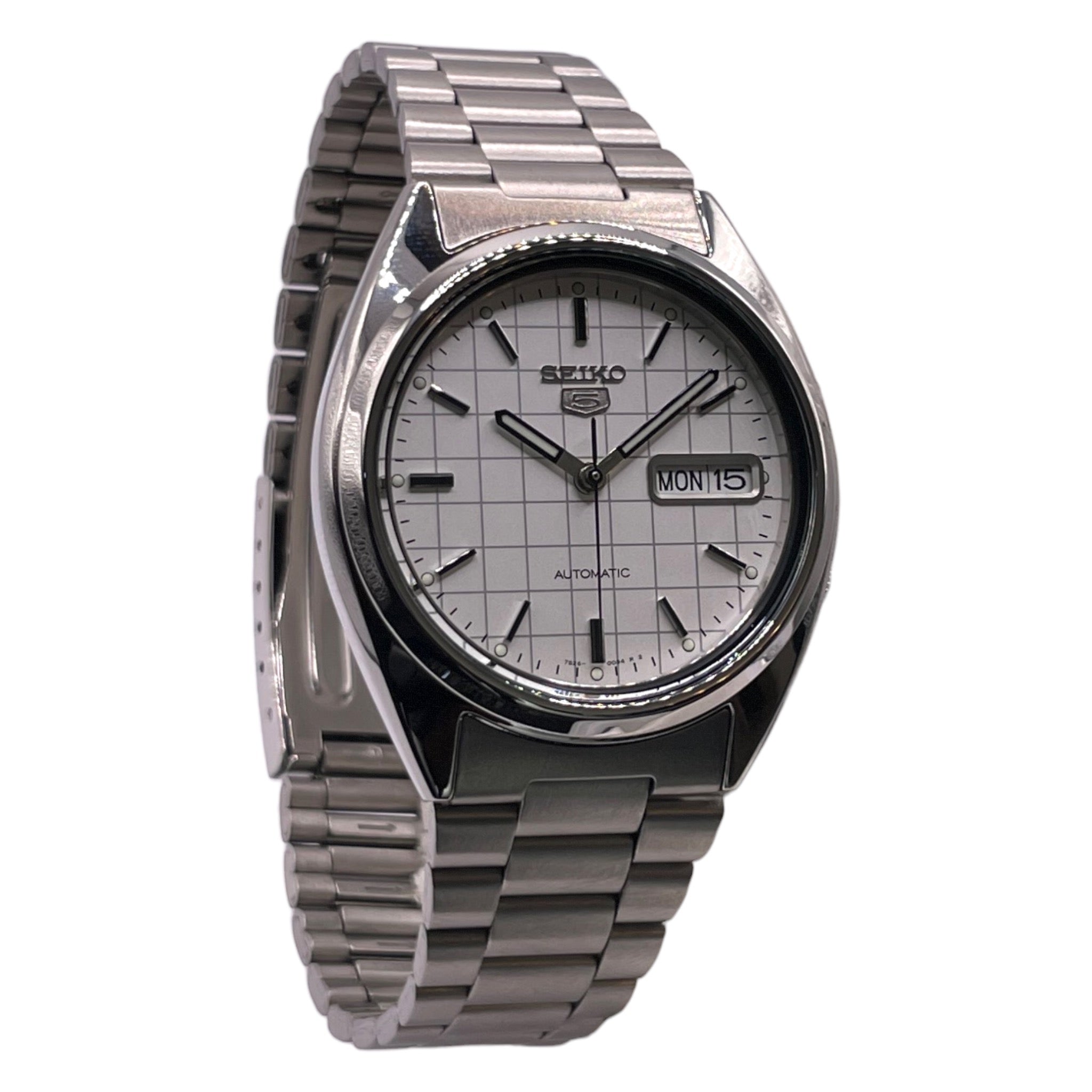 Montre Seiko argentée, avec cadran blanc rayé de 37mm, vue de côté