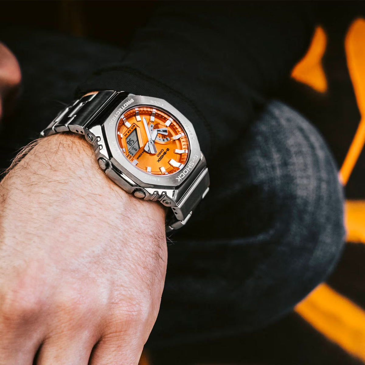 Casio G-Shock GM-2110D-4A Herrenuhr Silber Orange