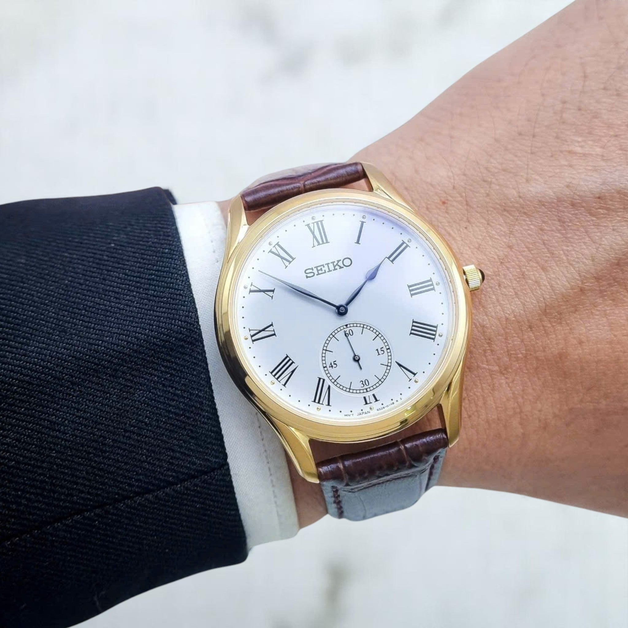 Montre Seiko Classic Homme SRK050P1 Doré Blanc Cuir Marron Quartz